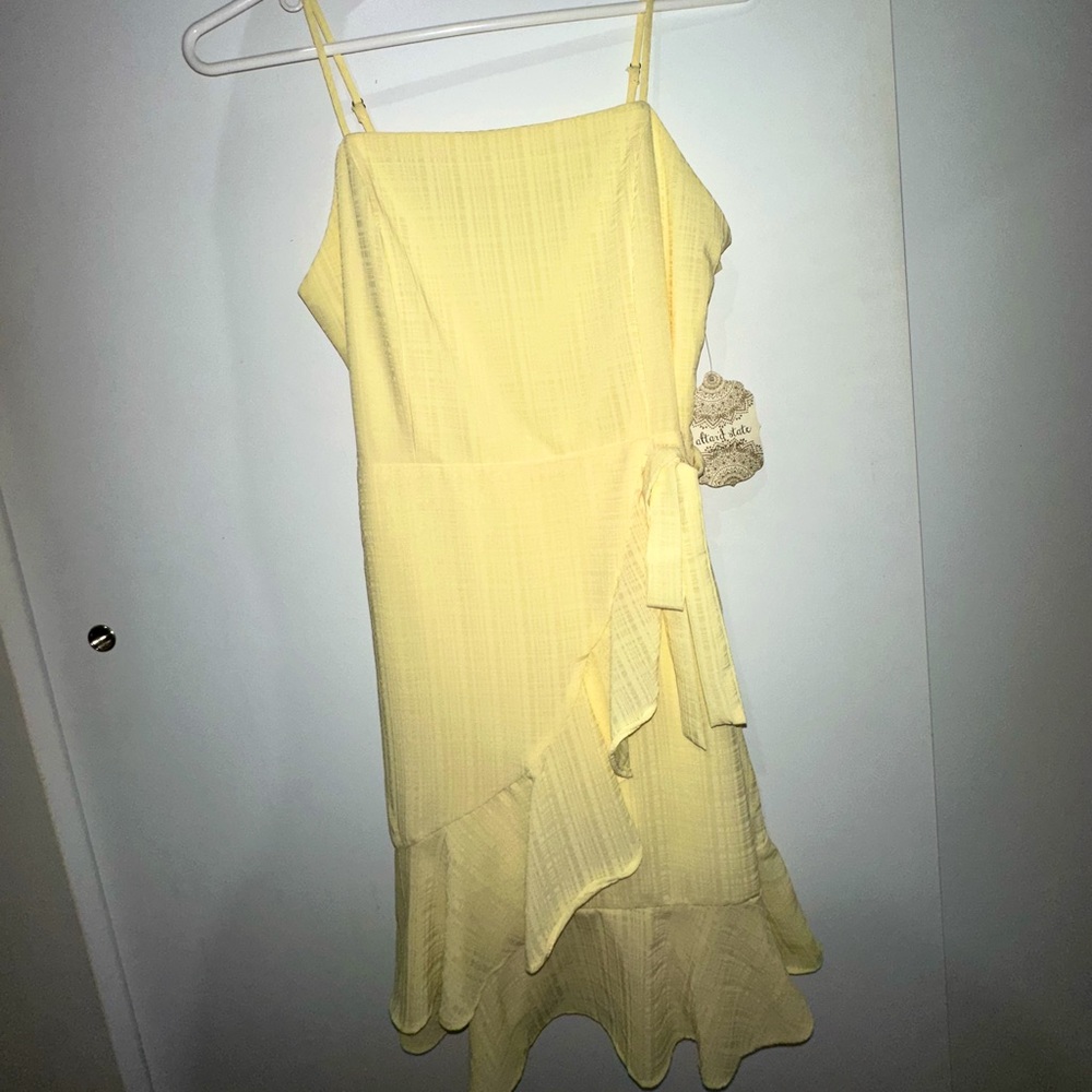 Yellow ruffle mini dress